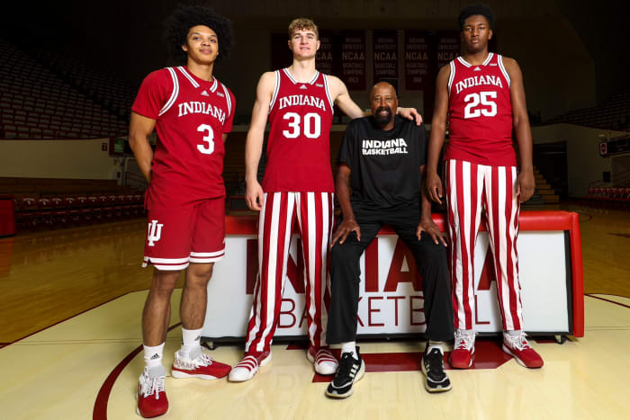 Montverde Academy teammates Curtis Givens III (3), Liam McNeeley (30), Derik Queen (25) and Indiana coach Mike Woodson pictured together at Simon Skjodt Assembly Hall in Bloomington, Ind.